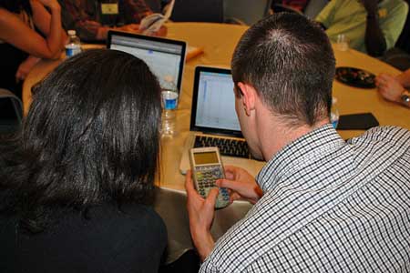 photo of calculator and computer